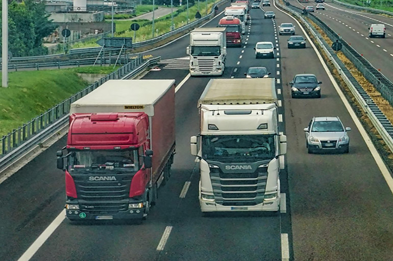 Road freight trucks on